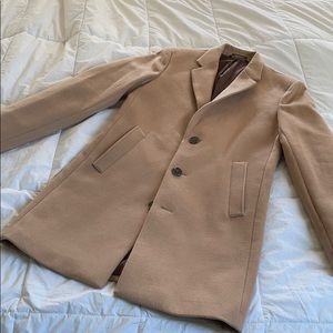 Men’s coat, tan size S.